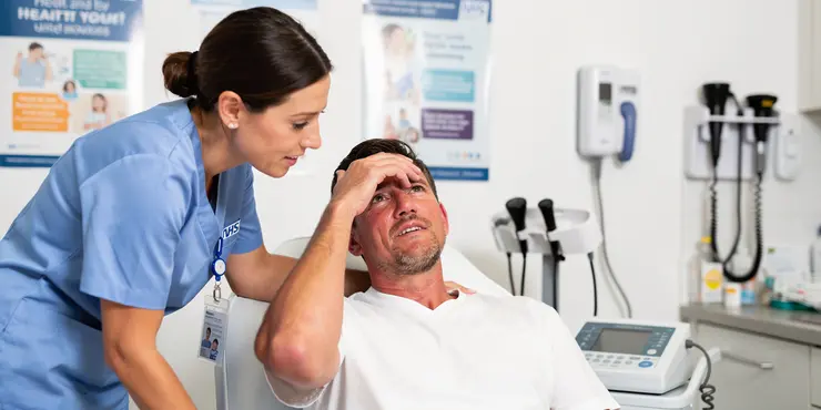 What are some signs of heat exhaustion?